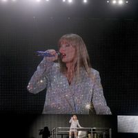 Taylor Swift performing on her Eras Tour at State Farm Stadium in Glendale, Arizona