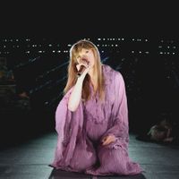 Taylor Swift performing on her Eras Tour at State Farm Stadium in Glendale, Arizona