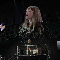 Taylor Swift performing on her Eras Tour at AT&T Stadium in Arlington, Texas