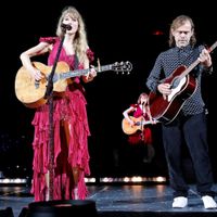 Taylor Swift performing on her Eras Tour at Raymond James Stadium in Tampa, Florida