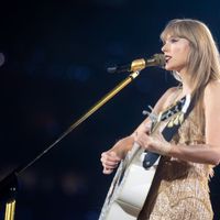 Taylor Swift performing on her Eras Tour at Mercedes-Benz Stadium in Atlanta, Georgia