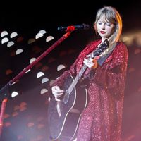 Taylor Swift performing on her Eras Tour at Mercedes-Benz Stadium in Atlanta, Georgia