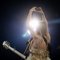 Taylor Swift performing on her Eras Tour at Mercedes-Benz Stadium in Atlanta, Georgia