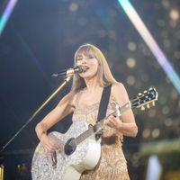 Taylor Swift performing on her Eras Tour at Mercedes-Benz Stadium in Atlanta, Georgia