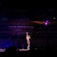 Taylor Swift performing on her Eras Tour at Mercedes-Benz Stadium in Atlanta, Georgia