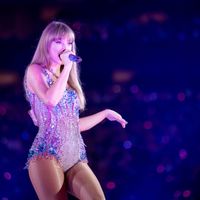 Taylor Swift performing on her Eras Tour at Mercedes-Benz Stadium in Atlanta, Georgia