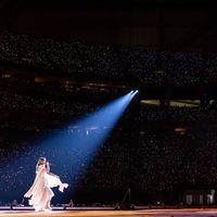 Taylor Swift performing on her Eras Tour at Mercedes-Benz Stadium in Atlanta, Georgia