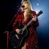 Taylor Swift performing on her Eras Tour at Mercedes-Benz Stadium in Atlanta, Georgia