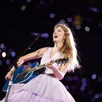 Taylor Swift performing on her Eras Tour at SoFi Stadium in Los Angeles, California