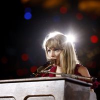 Taylor Swift performing on her Eras Tour at SoFi Stadium in Los Angeles, California