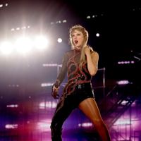 Taylor Swift performing on her Eras Tour at SoFi Stadium in Los Angeles, California