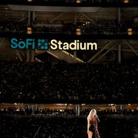 Taylor Swift performing on her Eras Tour at SoFi Stadium in Los Angeles, California